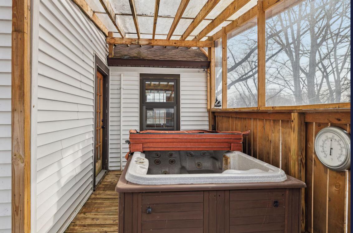 11089 4 Mile Road Battle Creek, MI 49015 - Photo 32 of 39 Hot tub back deck