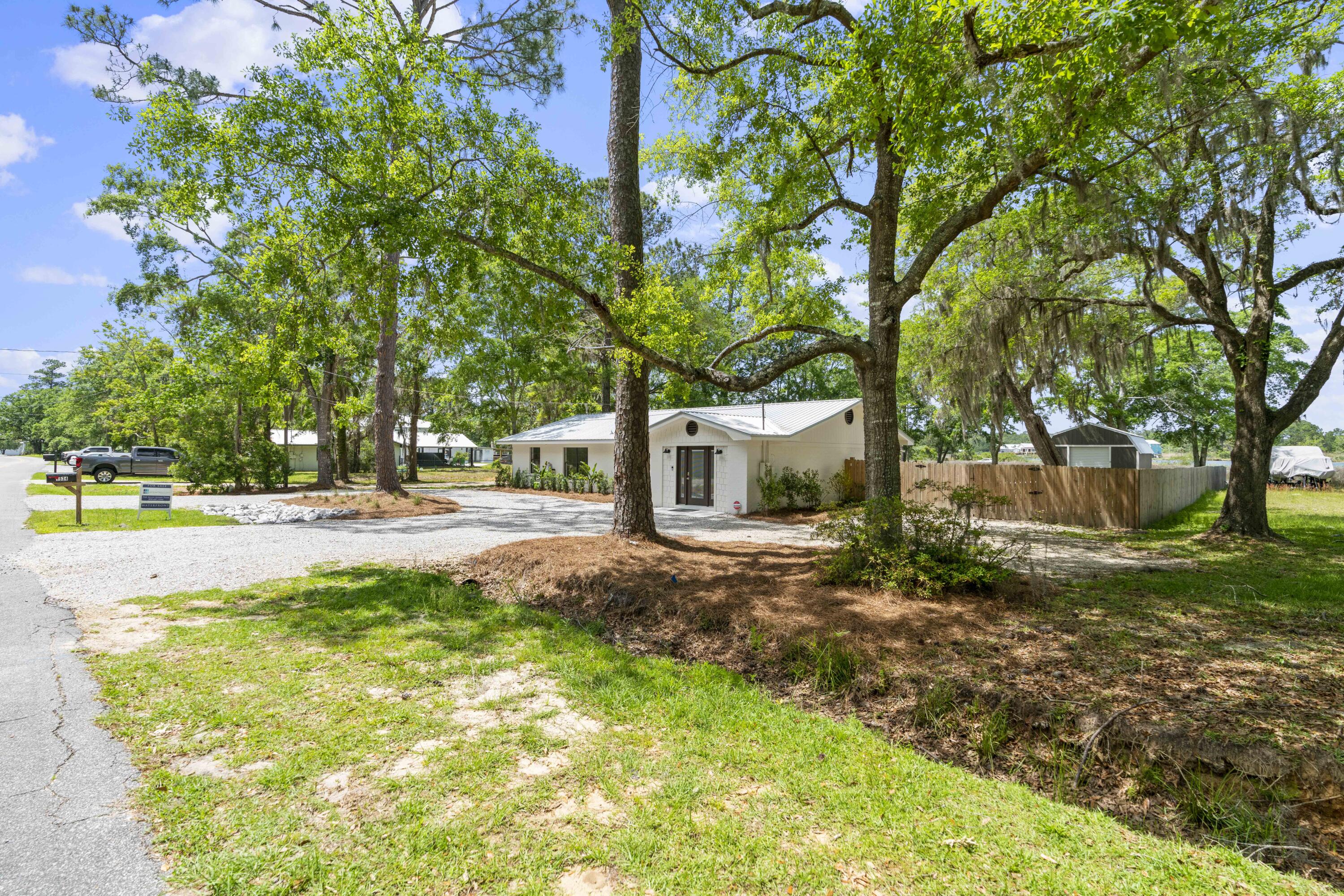 1534 Bay Grove Road Freeport, FL 32439 - Photo 28 of 33 a view of outdoor space with garden