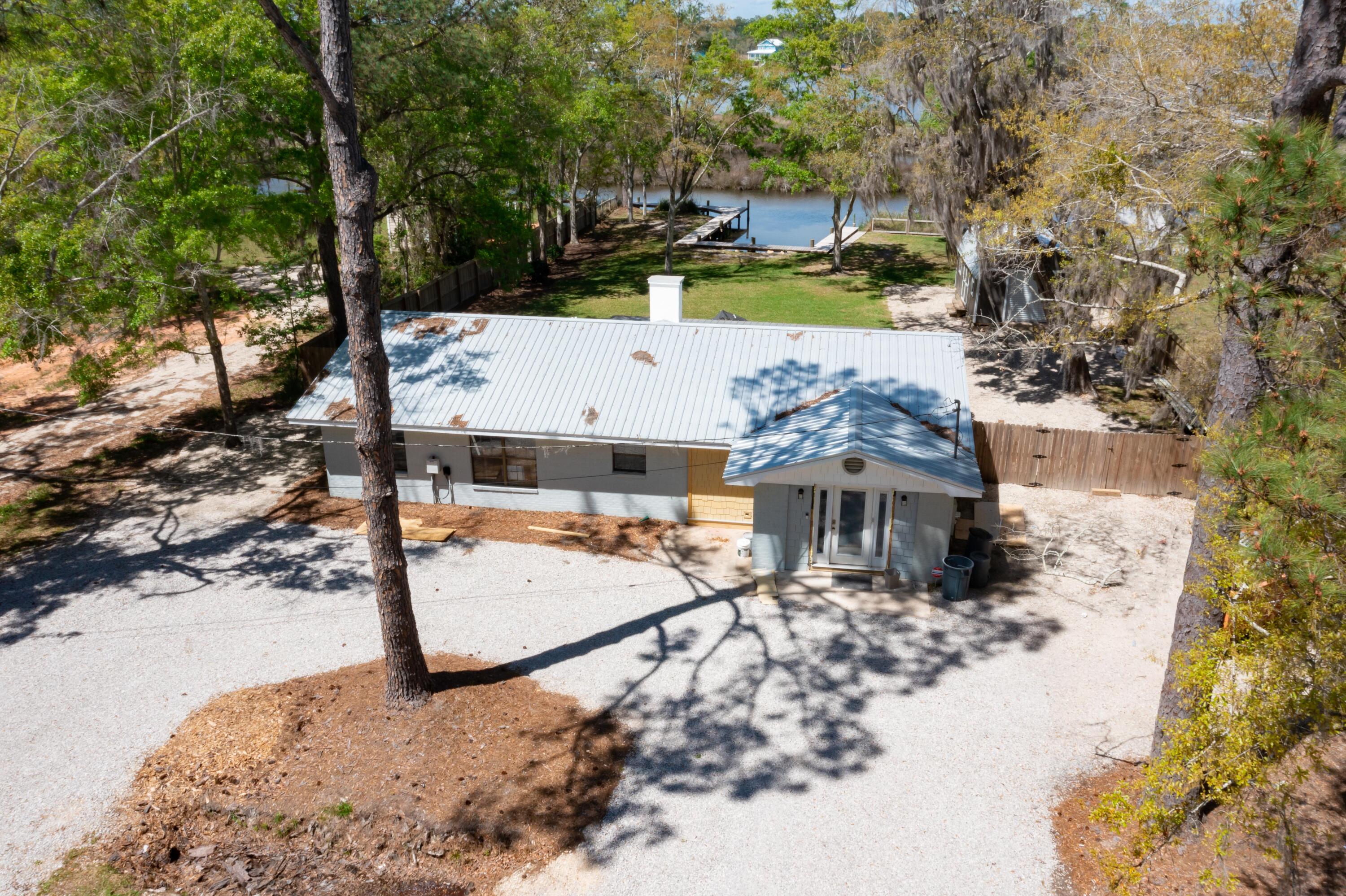 1534 Bay Grove Road Freeport, FL 32439 - Photo 30 of 33 a view of a yard with plants