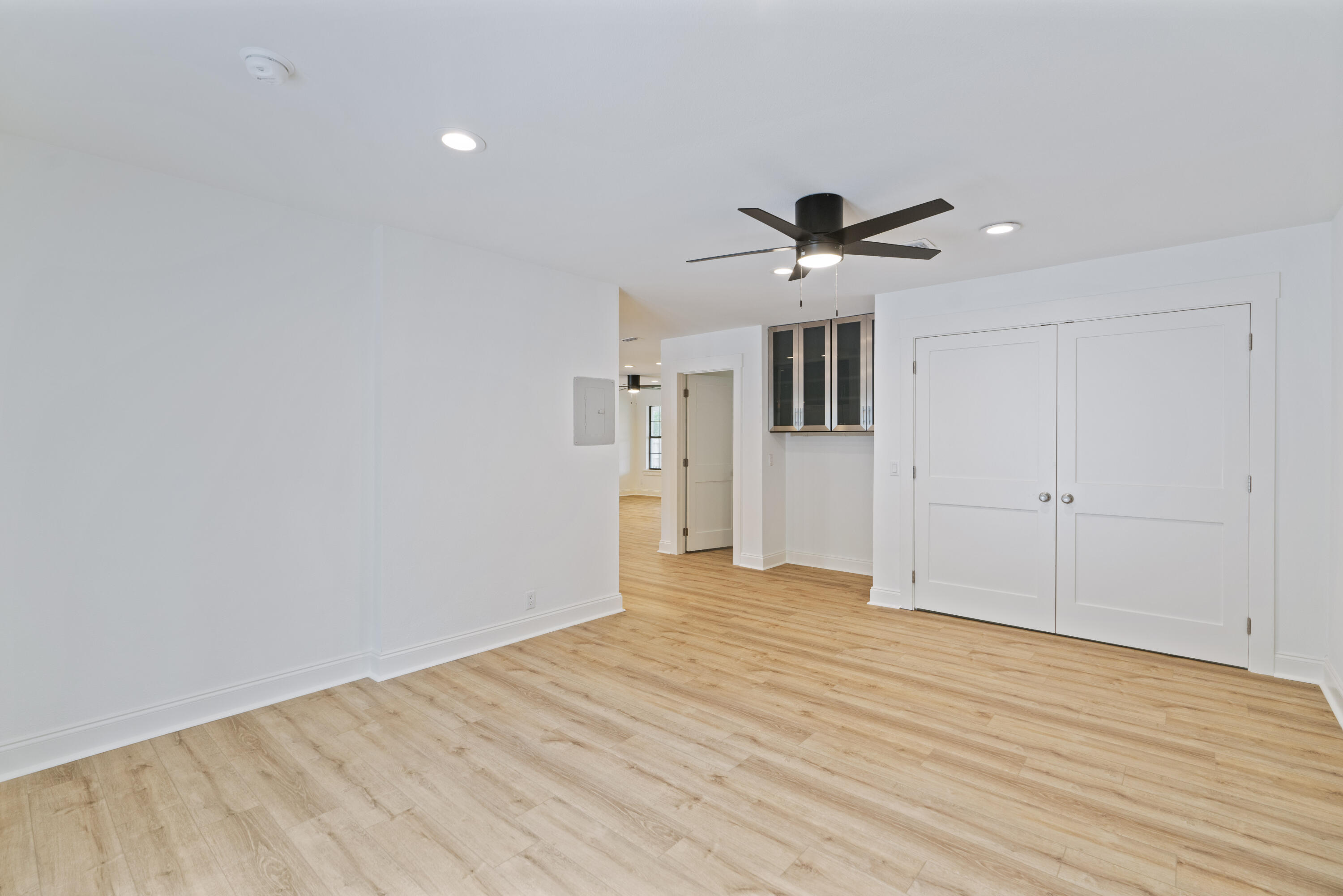 1534 Bay Grove Road Freeport, FL 32439 - Photo 5 of 33 a view of an empty room with wooden floor
