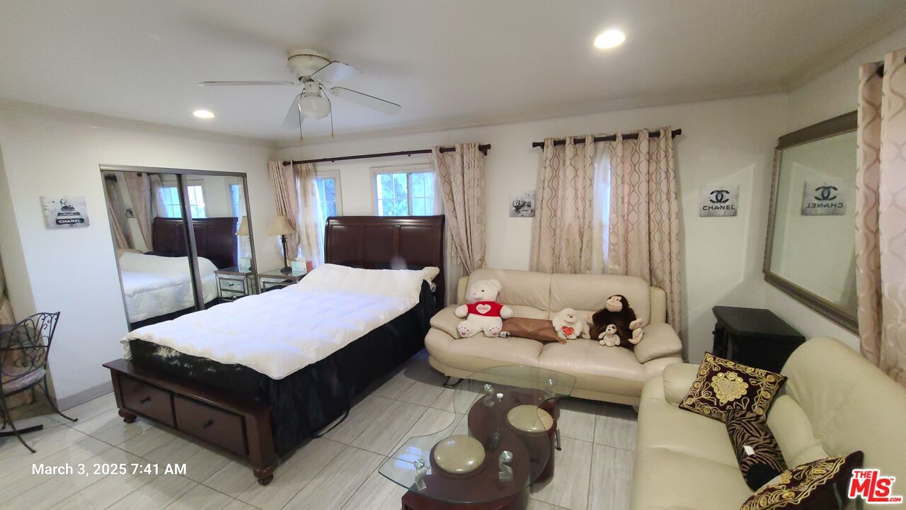 10798 Lindbrook Drive, Unit B Los Angeles, CA 90024 - Photo 1 of 12 a room with furniture and window