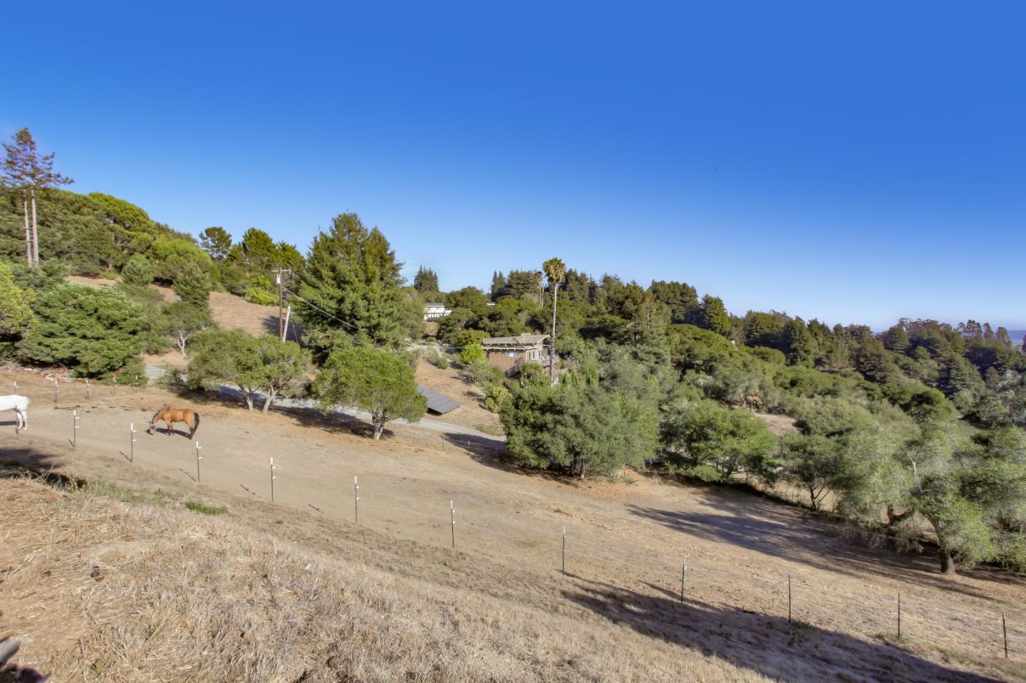 990 Smith Road Watsonville, CA 95076 - Photo 42 of 63 a view of a road with a yard