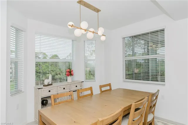 a dining room with wooden floor