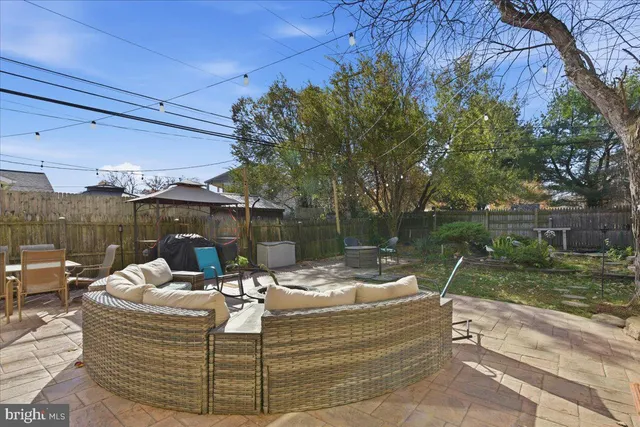 a view of a building with sitting area