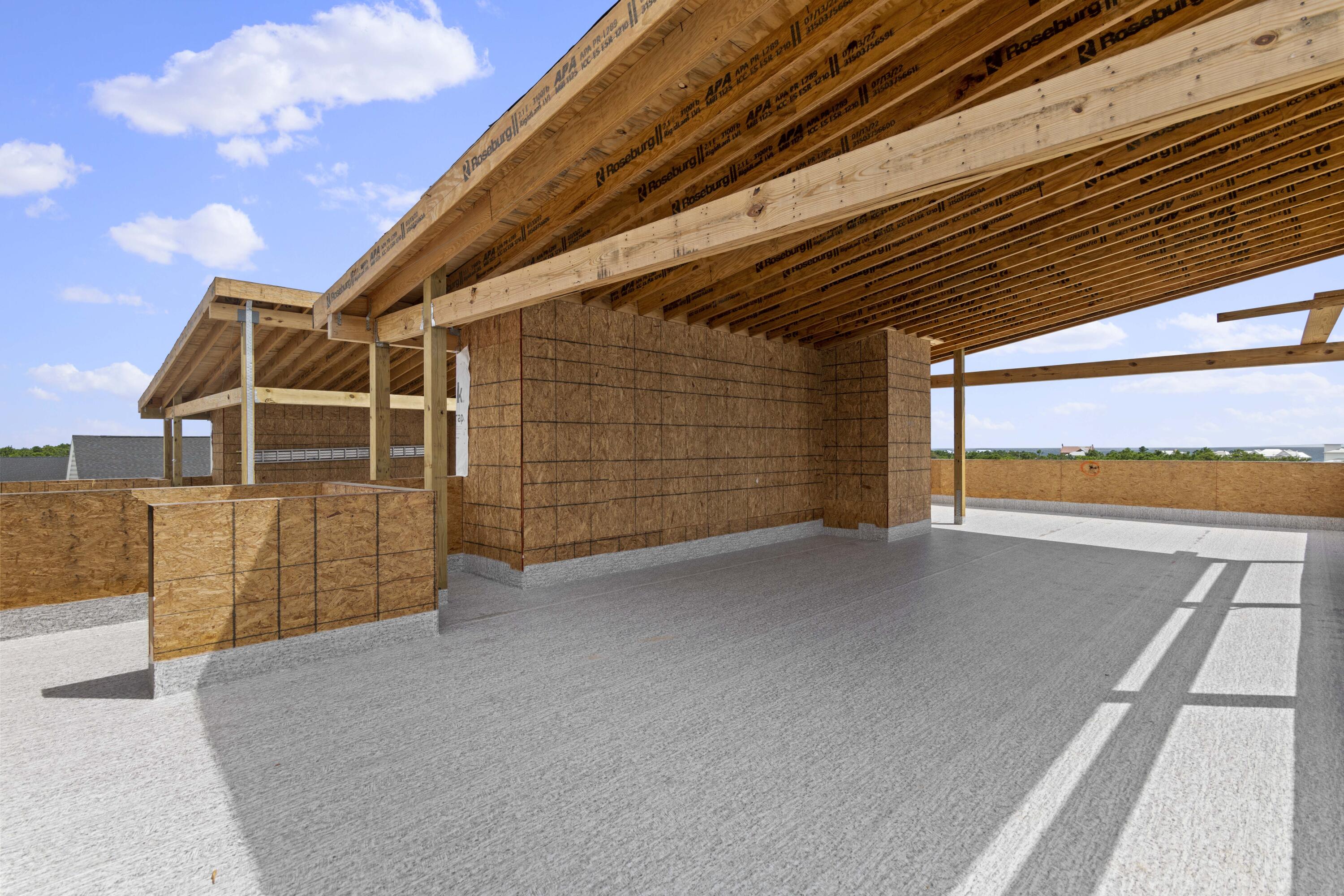 13063 Highway 98, Unit LOT 5 Inlet Beach, FL 32461 - Photo 12 of 14 a view of a big room with an empty space