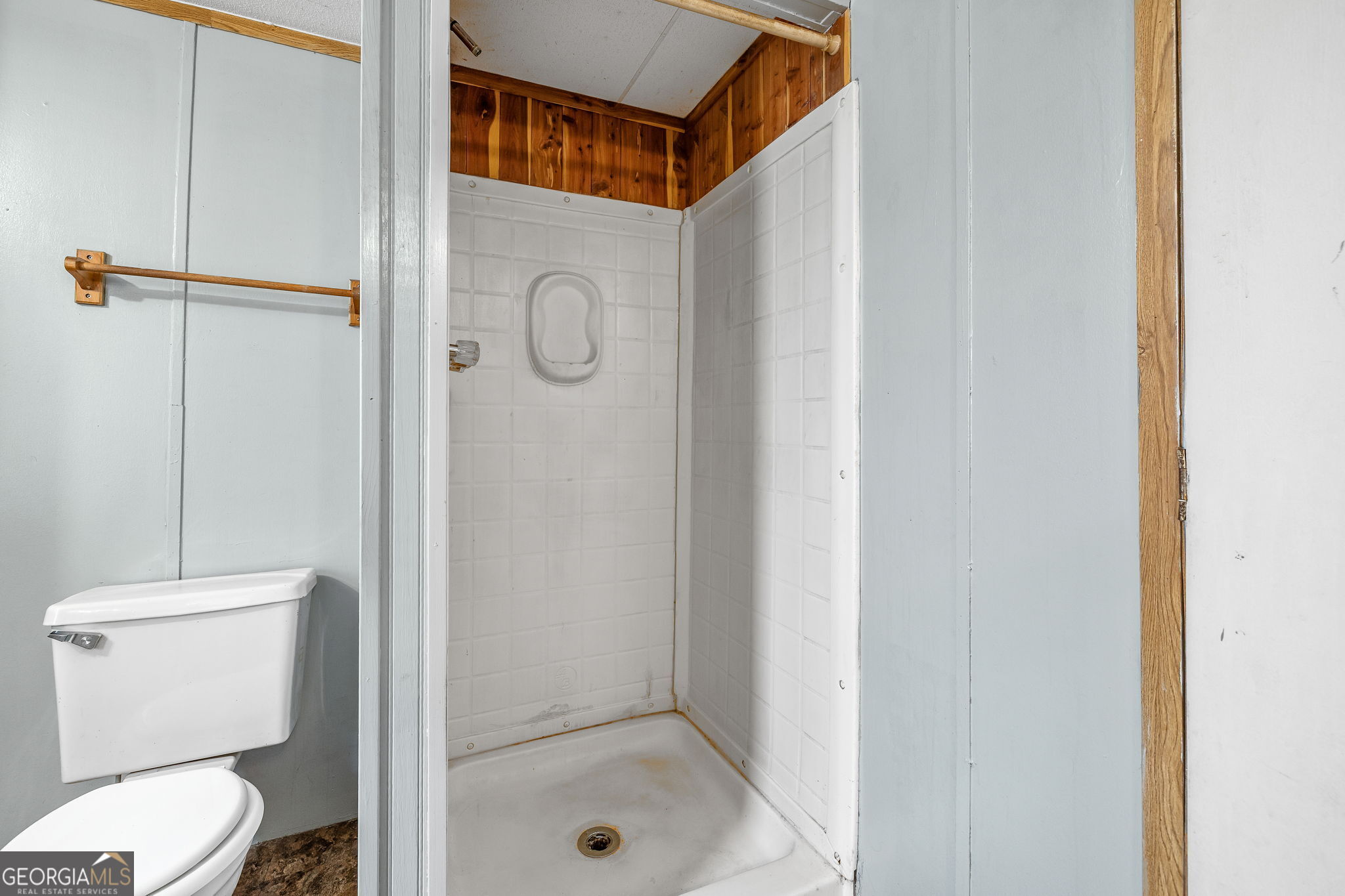401 Otis Brown Road Baldwin, GA 30511 - Photo 12 of 23 a bathroom with a toilet and a shower