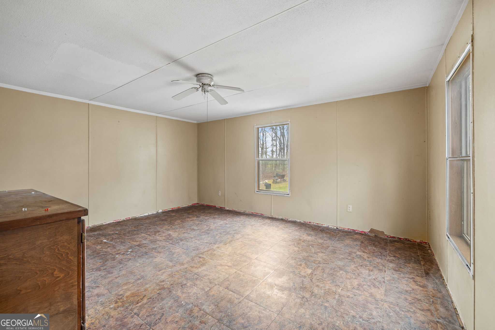 401 Otis Brown Road Baldwin, GA 30511 - Photo 14 of 23 a view of an empty room with a window