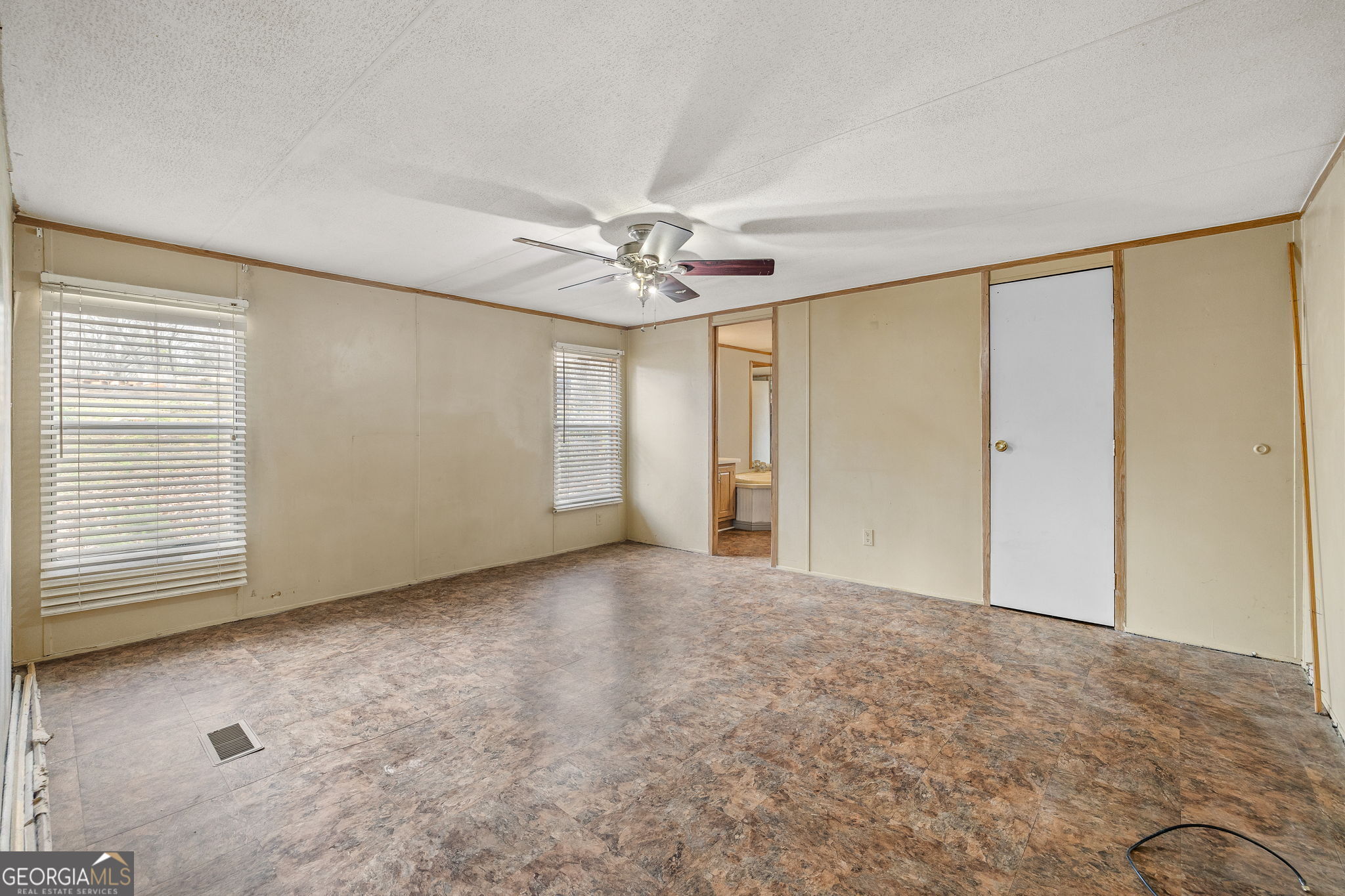 401 Otis Brown Road Baldwin, GA 30511 - Photo 9 of 23 a view of an empty room with a window