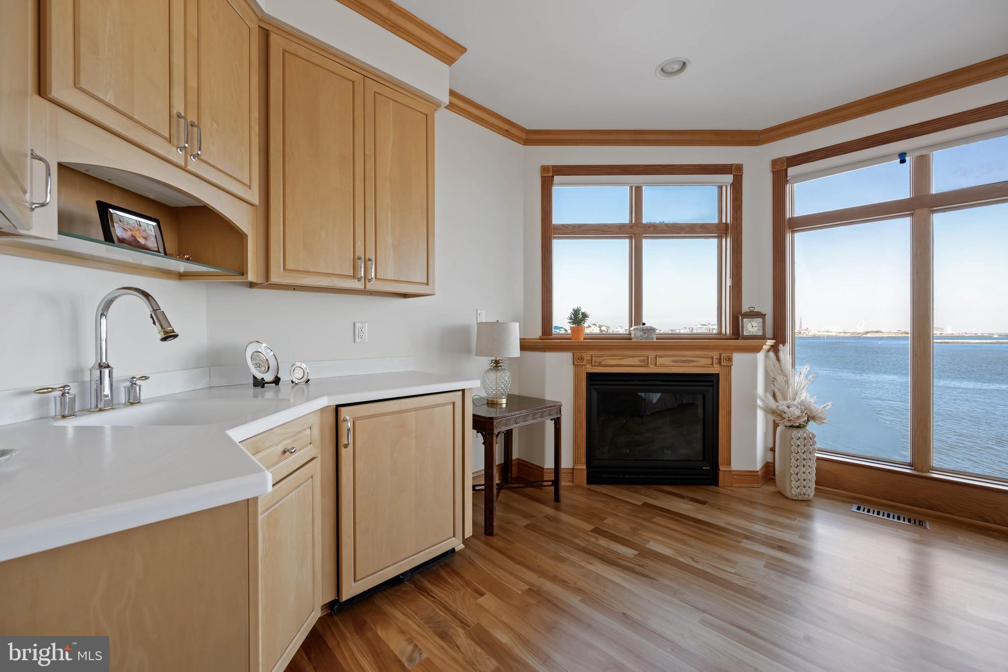 12959 Harbor Road Ocean City, MD 21842 - Photo 26 of 85 a kitchen with a sink and a stove top oven