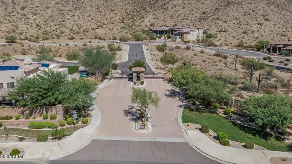 an aerial view of a house with outdoor space