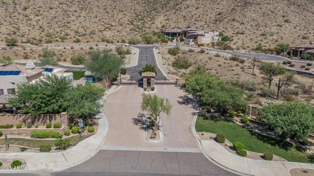 an aerial view of a house with outdoor space