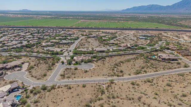 a view of a street with a yard
