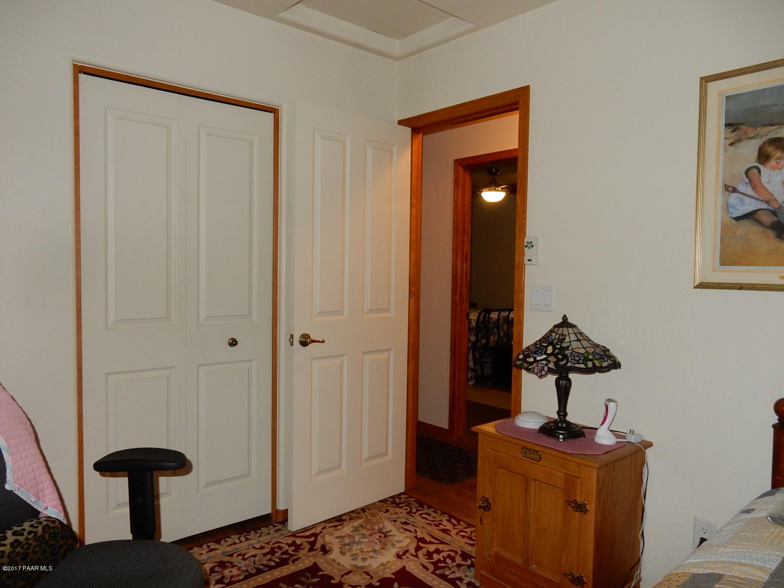 600 West Iris Road Paulden, AZ 86334 - Photo 23 of 39 a bedroom with a bed and a mirror