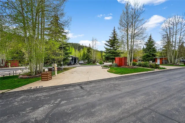 a view of a park with swings and slides