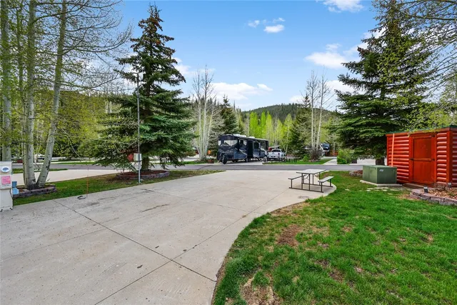a view of backyard with green space