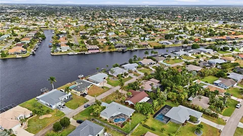 an aerial view of a house with a outdoor space