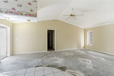a kitchen with a sink cabinets and window