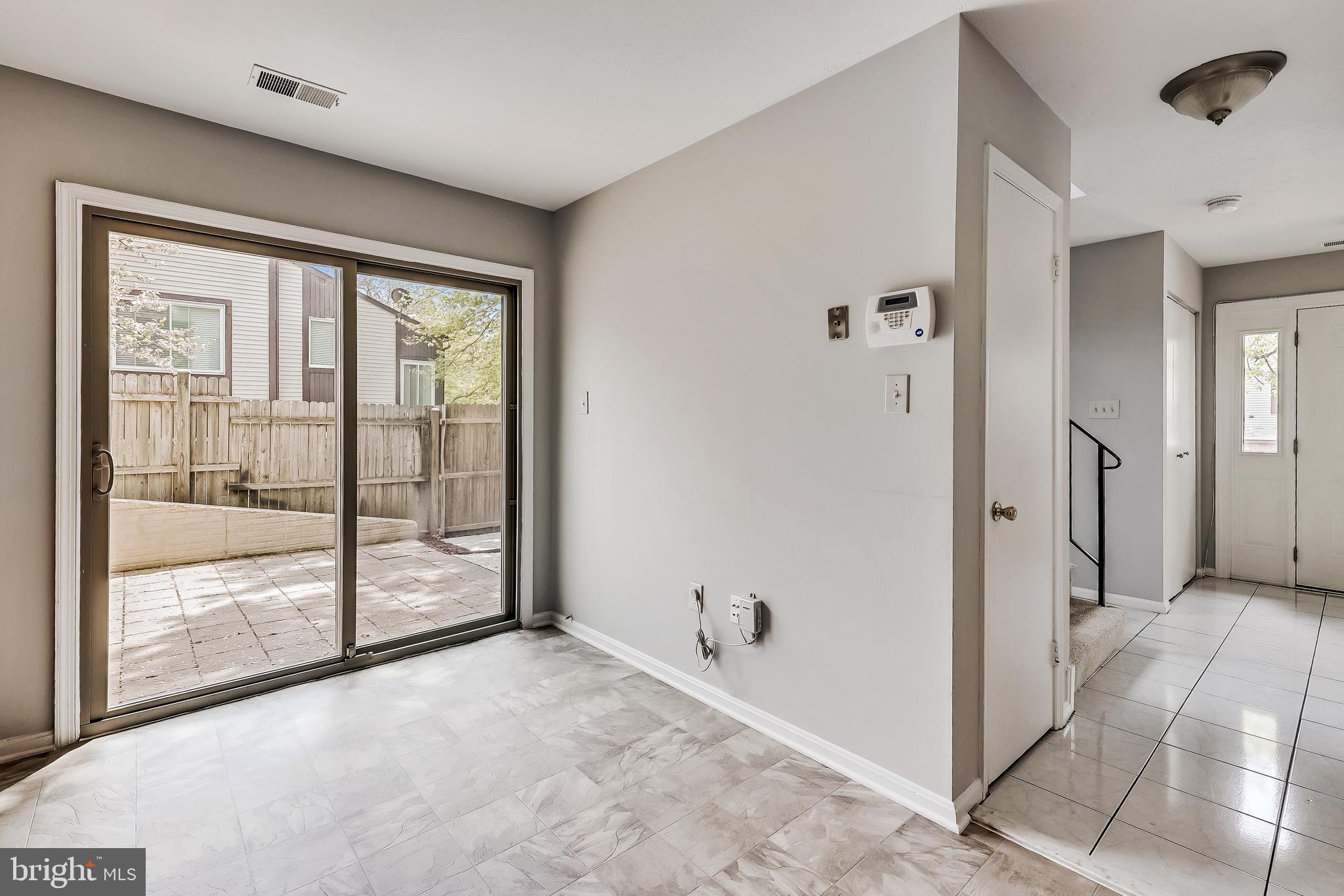 7206 Split Rail Lane Laurel, MD 20707 - Photo 14 of 37 slider to patio and fenced yard