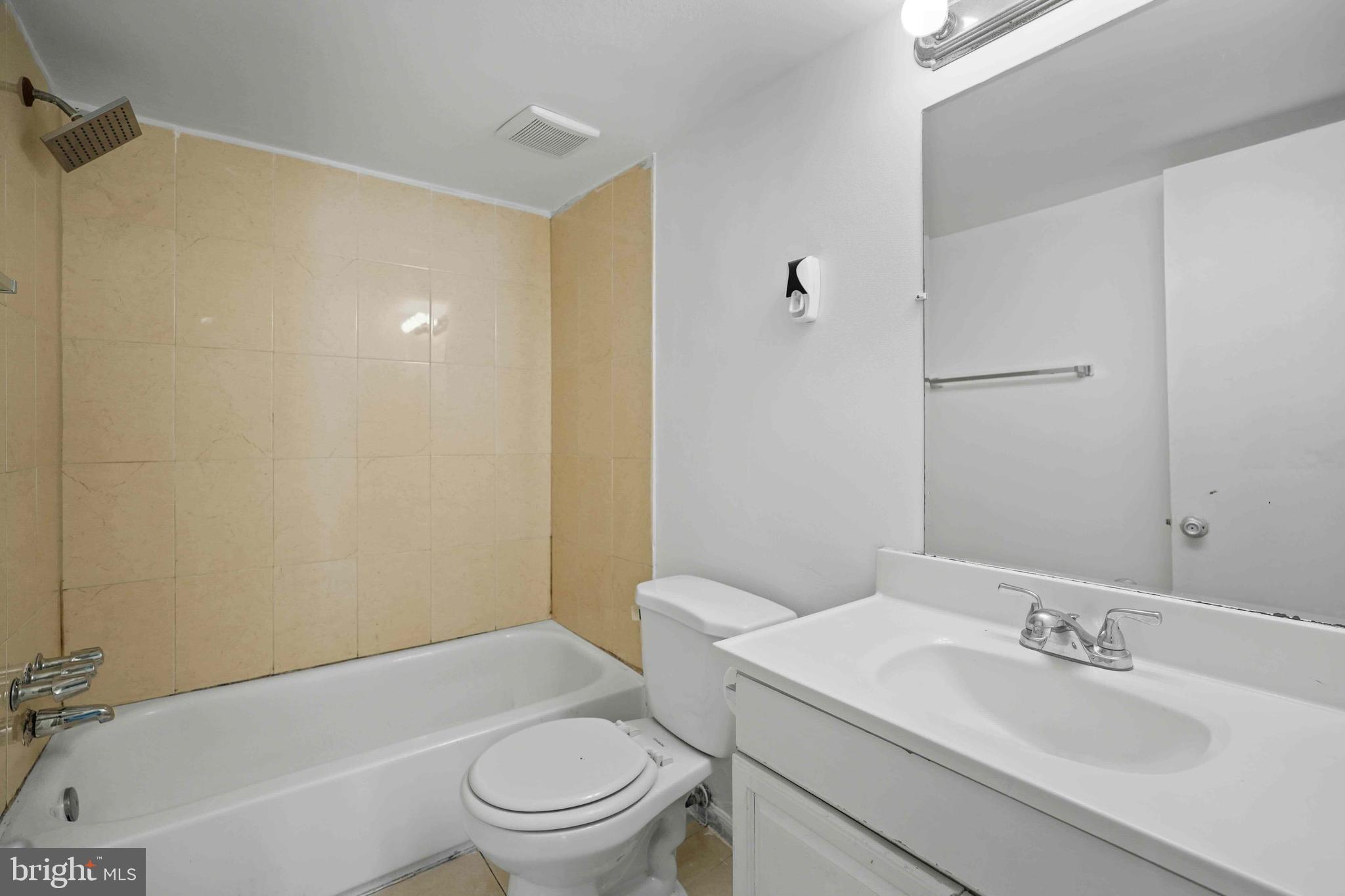 106 Duvall Lane, Unit 43 Gaithersburg, MD 20877 - Photo 22 of 38 a bathroom with a sink a toilet and shower