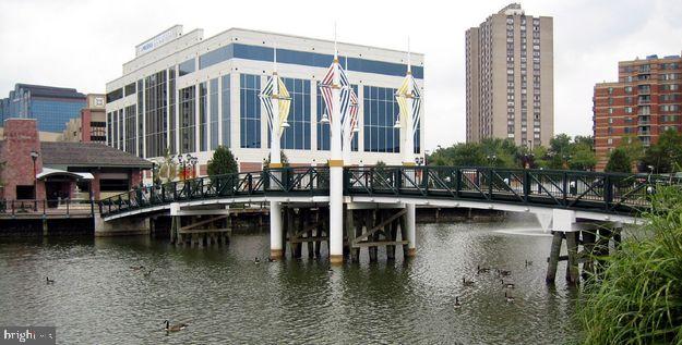 106 Duvall Lane, Unit 43 Gaithersburg, MD 20877 - Photo 33 of 38 a house with swimming pool and outdoor space