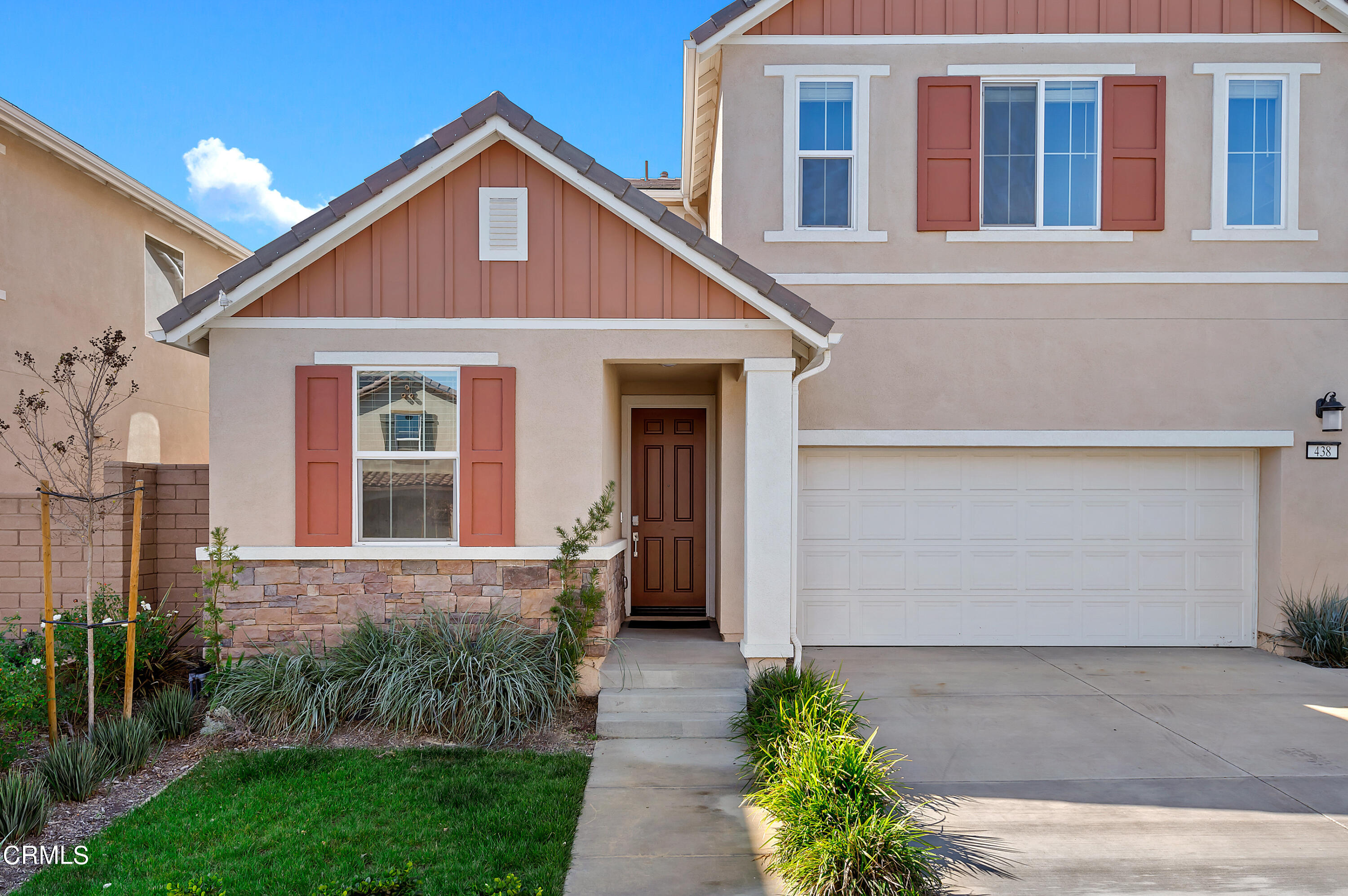 438 Lisbon Place Santa Paula, CA 93060 - Photo 2 of 24 a front view of a house with garden