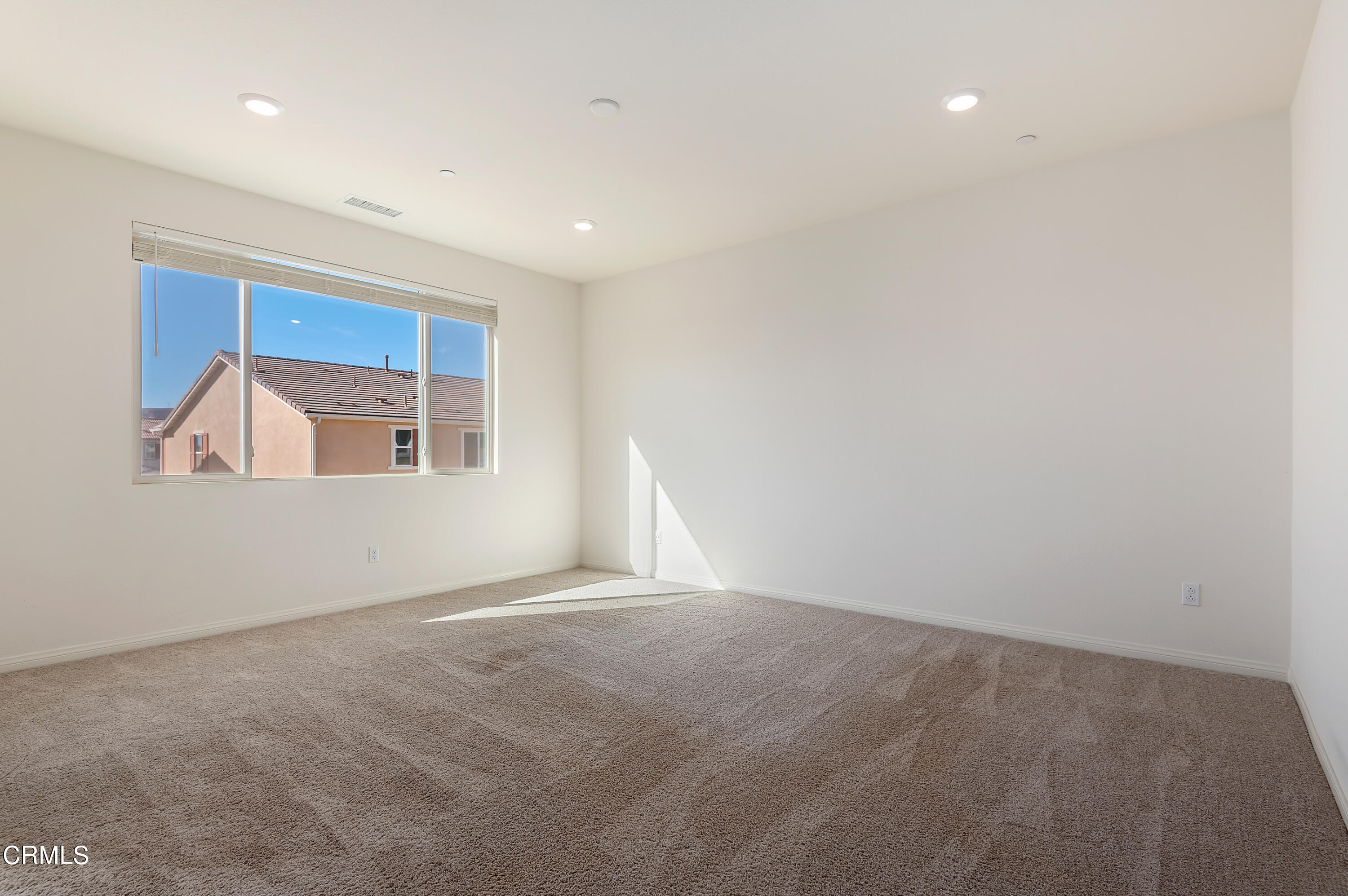 438 Lisbon Place Santa Paula, CA 93060 - Photo 12 of 24 a view of an empty room with a window
