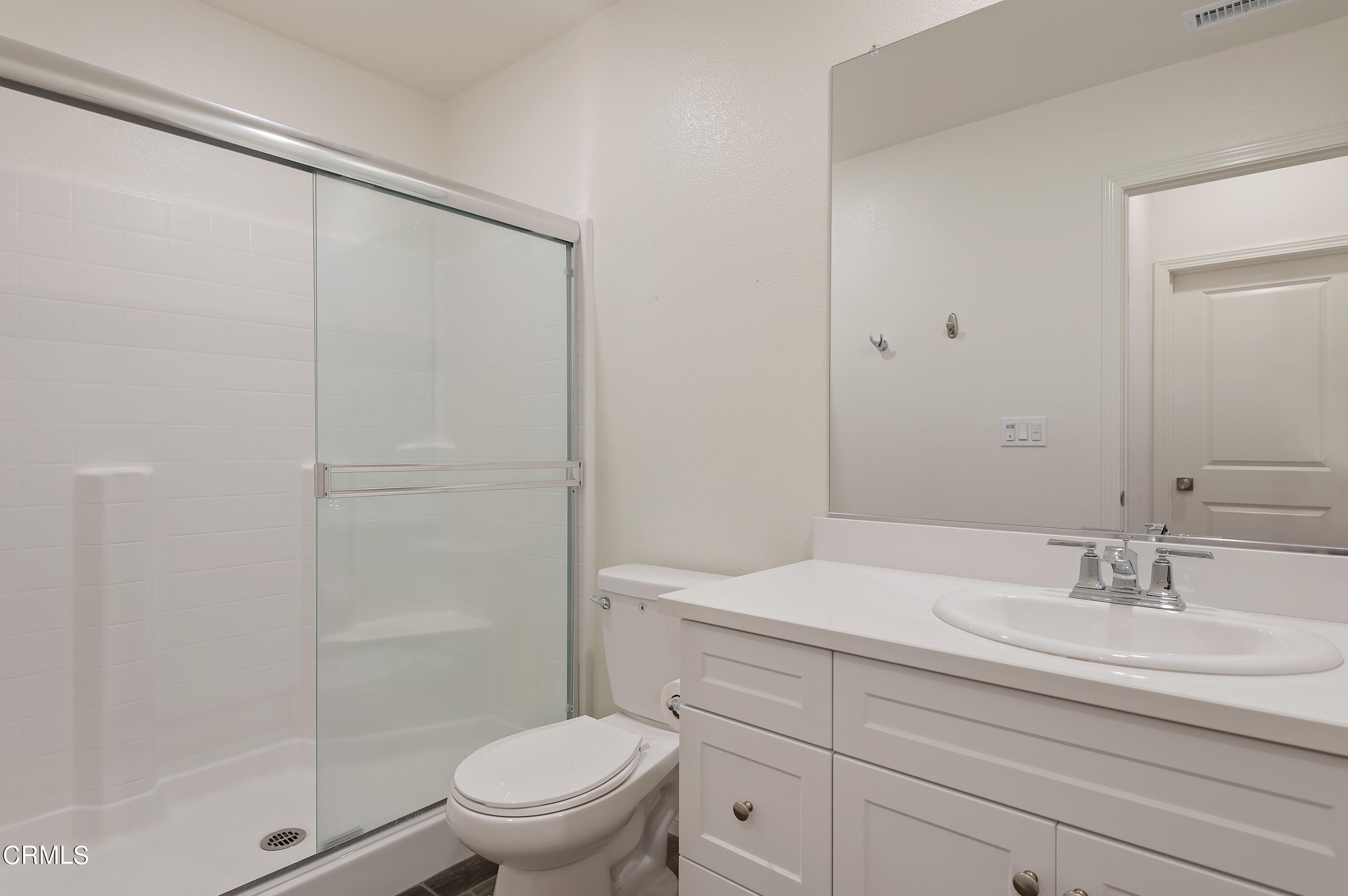 438 Lisbon Place Santa Paula, CA 93060 - Photo 19 of 24 a bathroom with a sink a toilet and shower