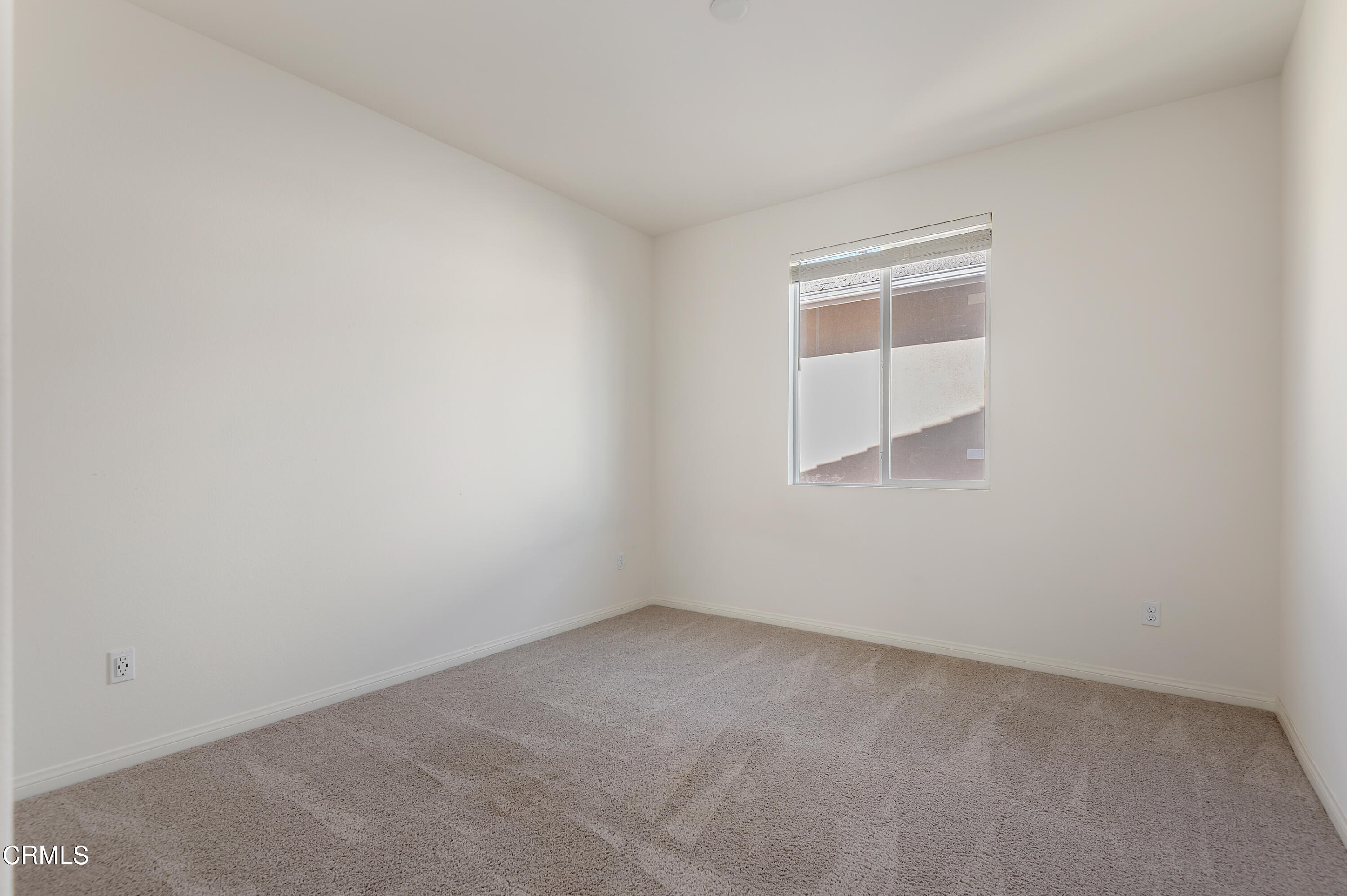 438 Lisbon Place Santa Paula, CA 93060 - Photo 20 of 24 a view of an empty room with a window