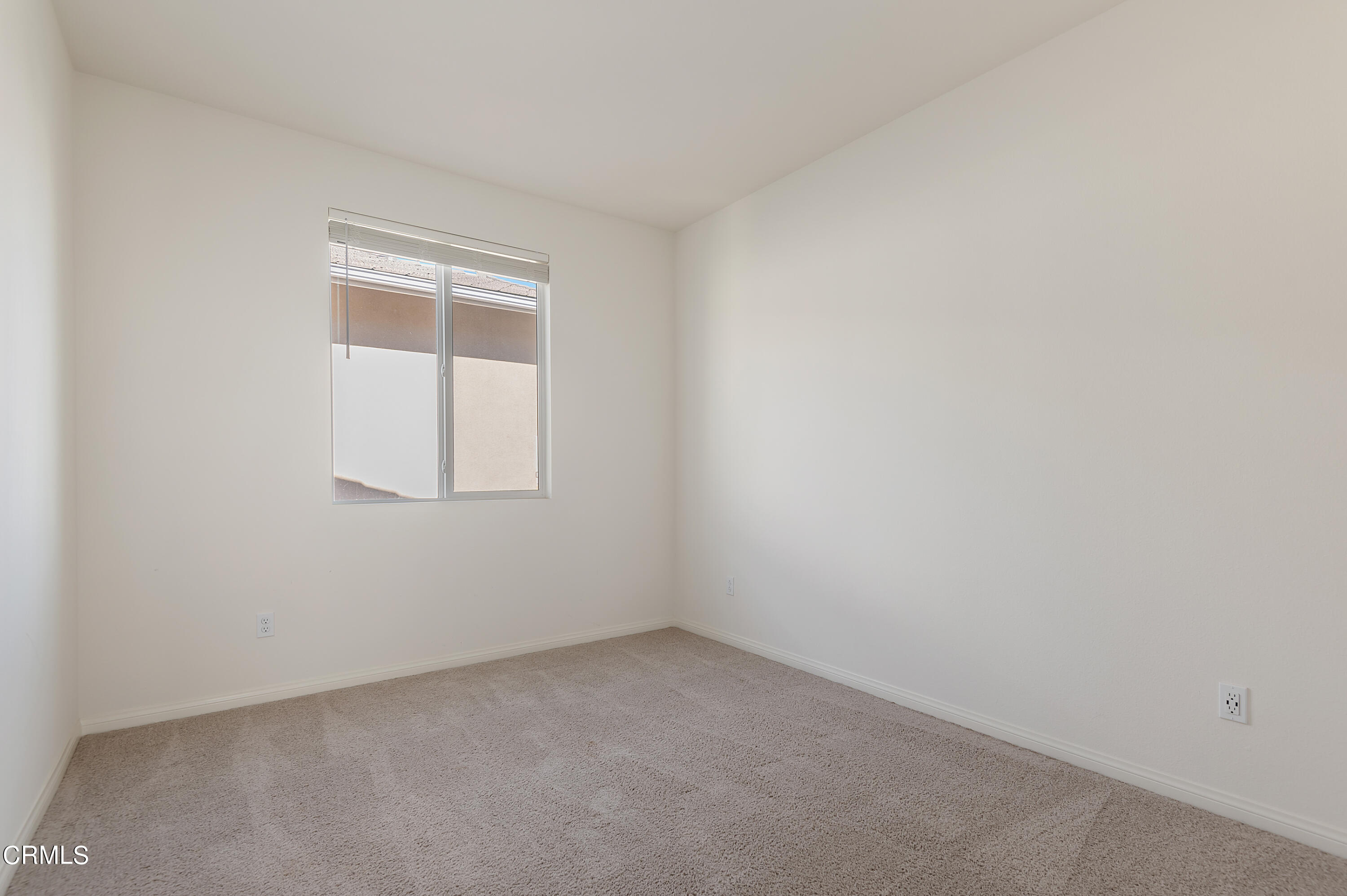 438 Lisbon Place Santa Paula, CA 93060 - Photo 22 of 24 a view of an empty room with a window