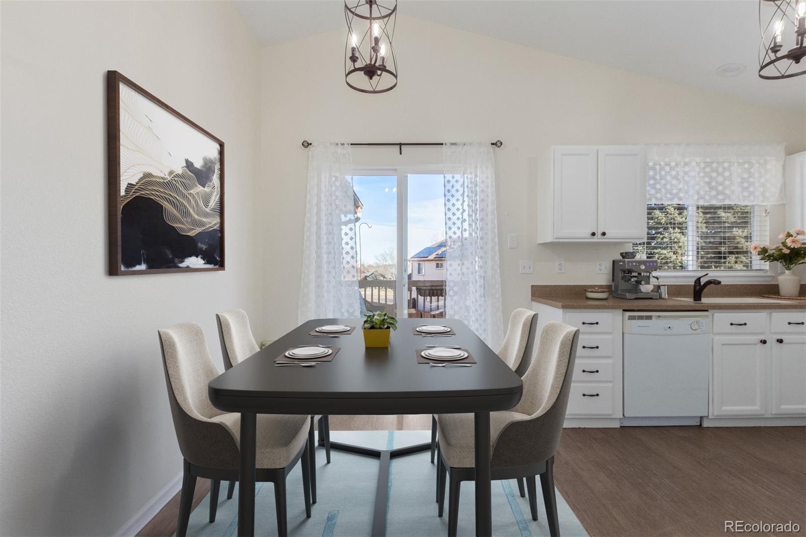 9488 Brook Lane Lone Tree, CO 80124 - Photo 13 of 49 a view of a dining room with furniture and window