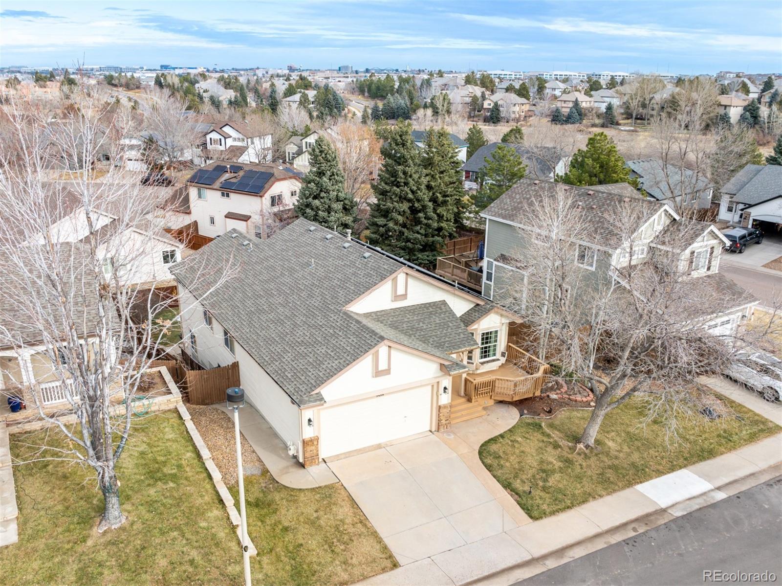 9488 Brook Lane Lone Tree, CO 80124 - Photo 46 of 49 an aerial view of a house with a yard