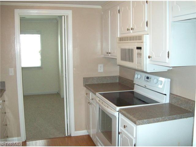 2970 St Marks Road Southwest, Unit D Winston-Salem, NC 27103 - Photo 5 of 14 Kitchen. Galley Ktichen with new range