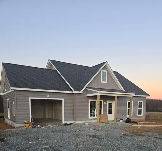 a front view of a house with yard
