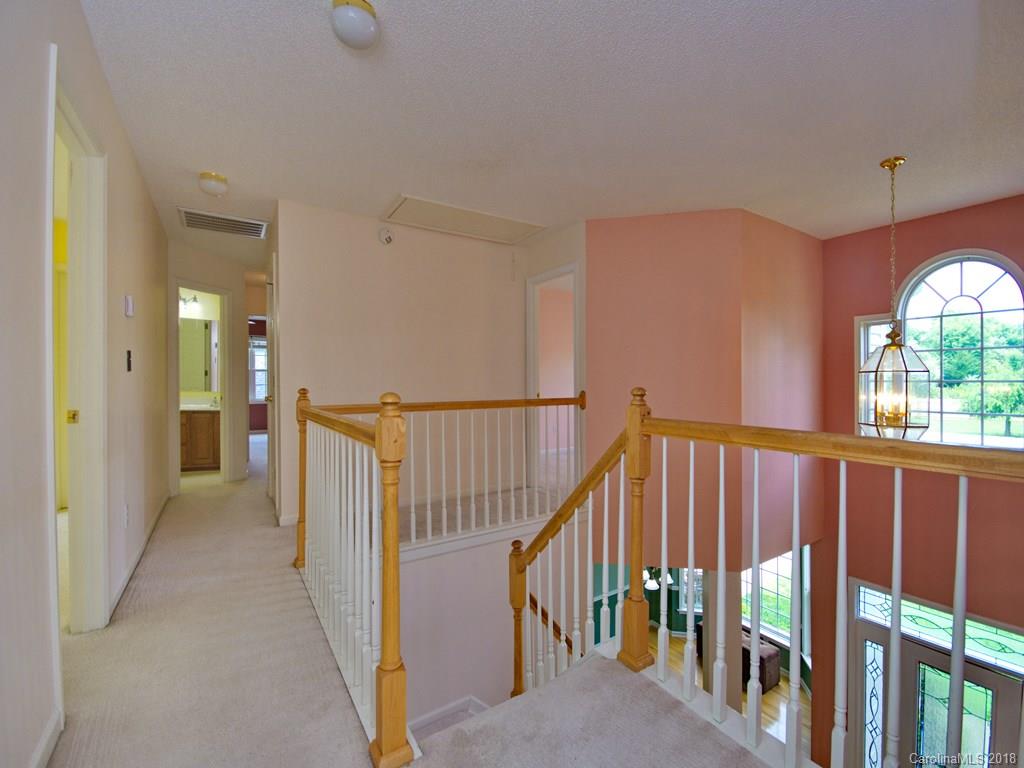 218 Walnut Crest Road, Unit 258 Fletcher, NC 28732 - Photo 13 of 24 a view interior of a house with wooden floor windows and stairs