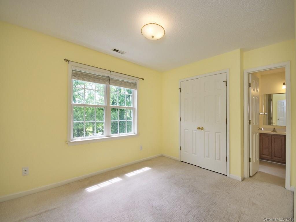 218 Walnut Crest Road, Unit 258 Fletcher, NC 28732 - Photo 17 of 24 a view of an empty room with a window