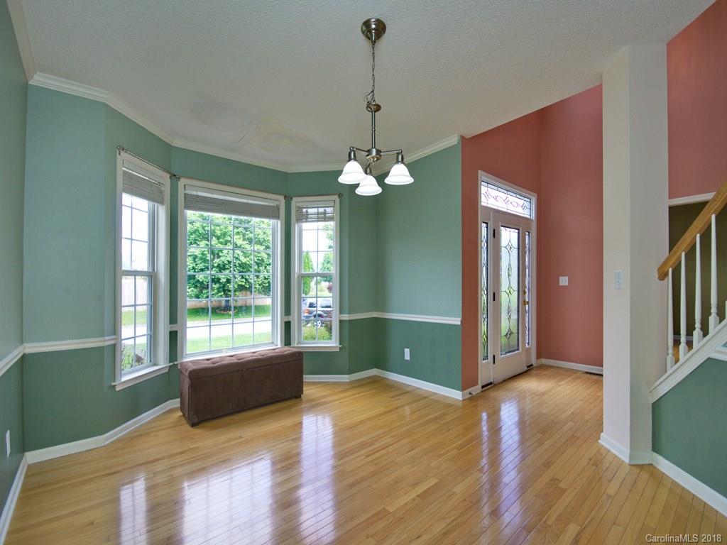 218 Walnut Crest Road, Unit 258 Fletcher, NC 28732 - Photo 3 of 24 a room with window and wooden floor