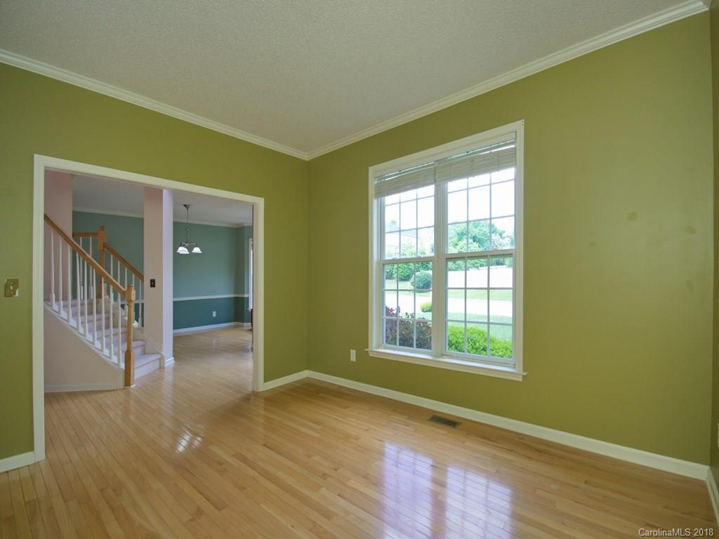 218 Walnut Crest Road, Unit 258 Fletcher, NC 28732 - Photo 4 of 24 a view of a room with wooden floor and windows