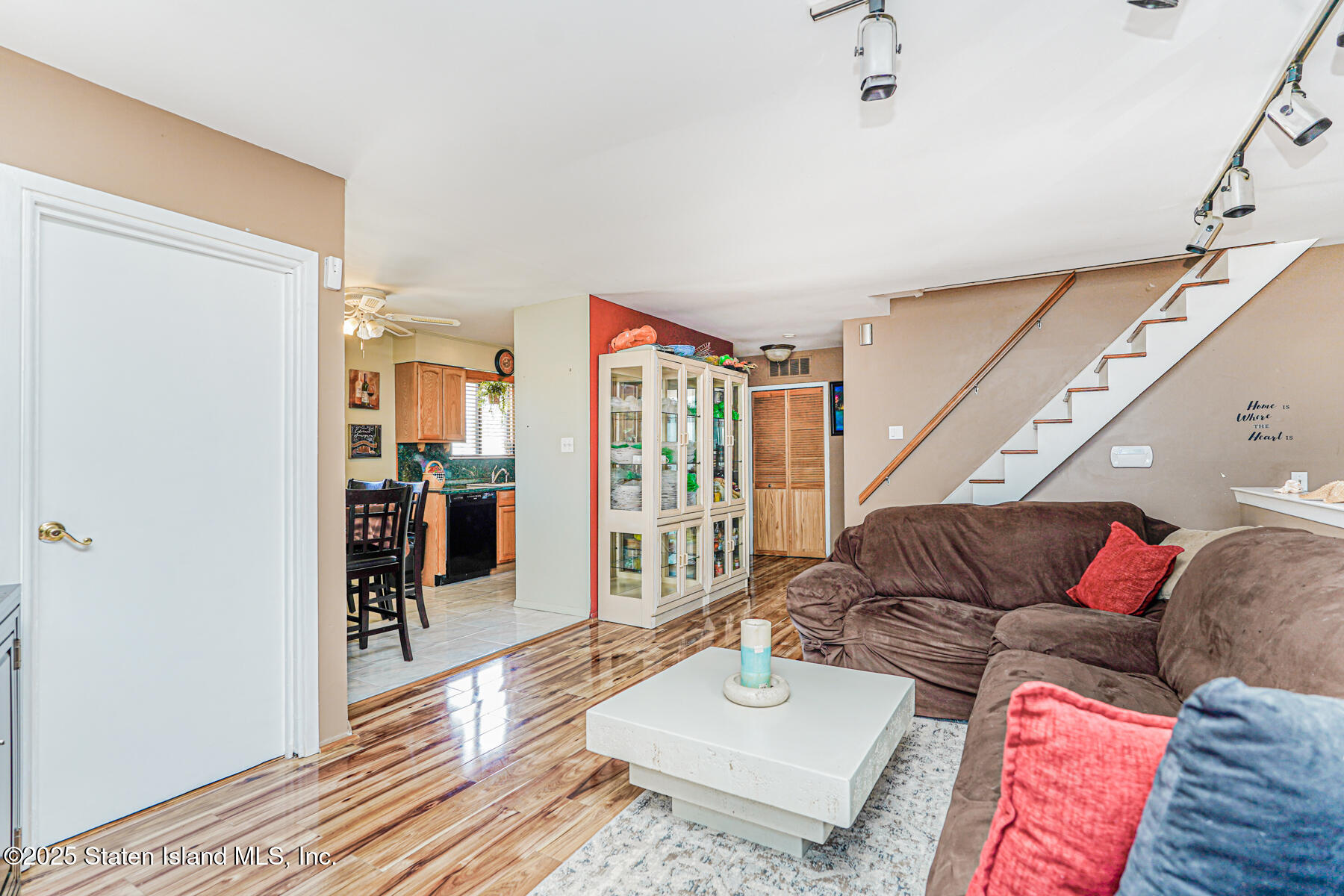 101 Stack Drive, Unit A Staten Island, NY 10312 - Photo 12 of 22 a living room with furniture and wooden floor