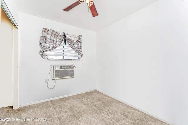 a view of a garage with rack on the wall