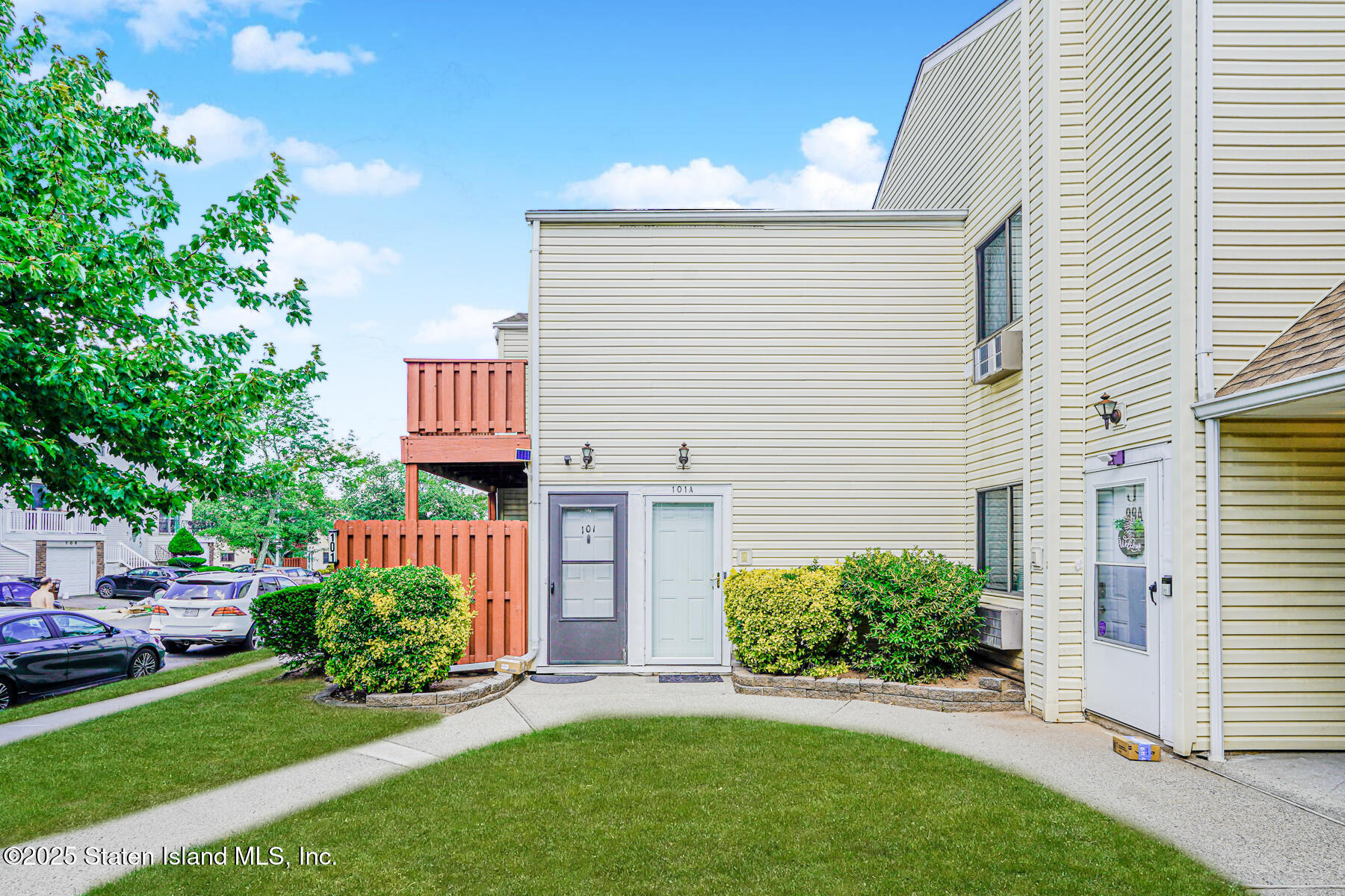 101 Stack Drive, Unit A Staten Island, NY 10312 - Photo 2 of 22 a front view of a house with a yard