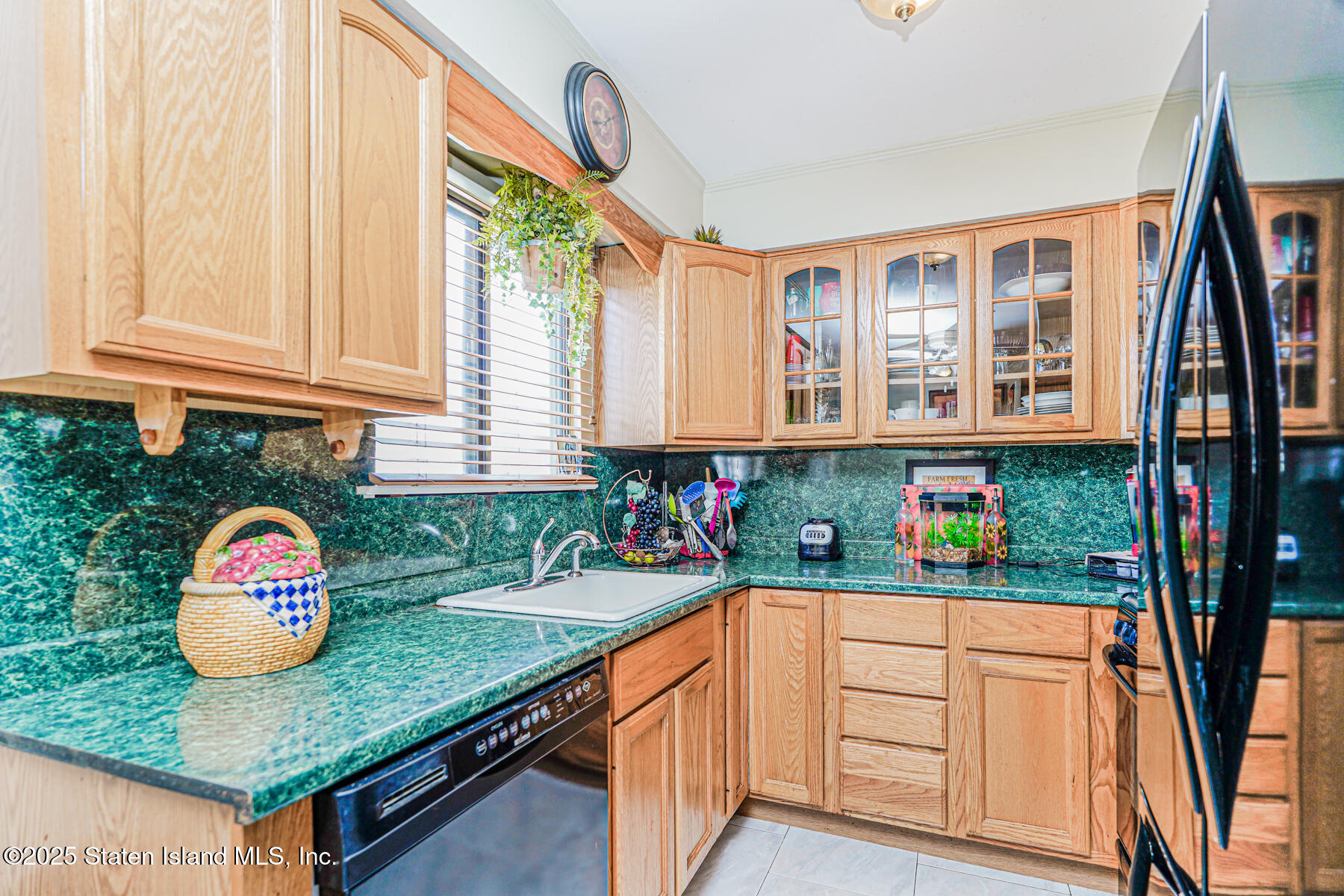 101 Stack Drive, Unit A Staten Island, NY 10312 - Photo 7 of 22 a kitchen with stainless steel appliances granite countertop a stove a sink and a refrigerator