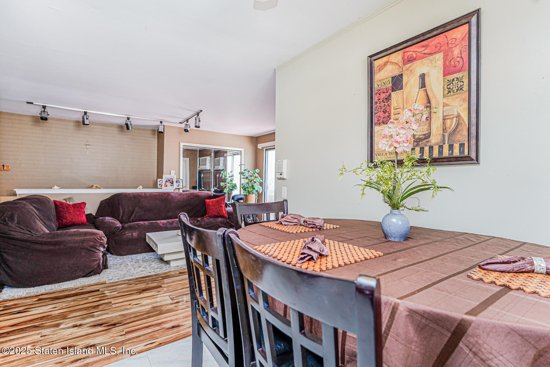 101 Stack Drive, Unit A Staten Island, NY 10312 - Photo 10 of 22 a view of a dining room with furniture and wooden floor