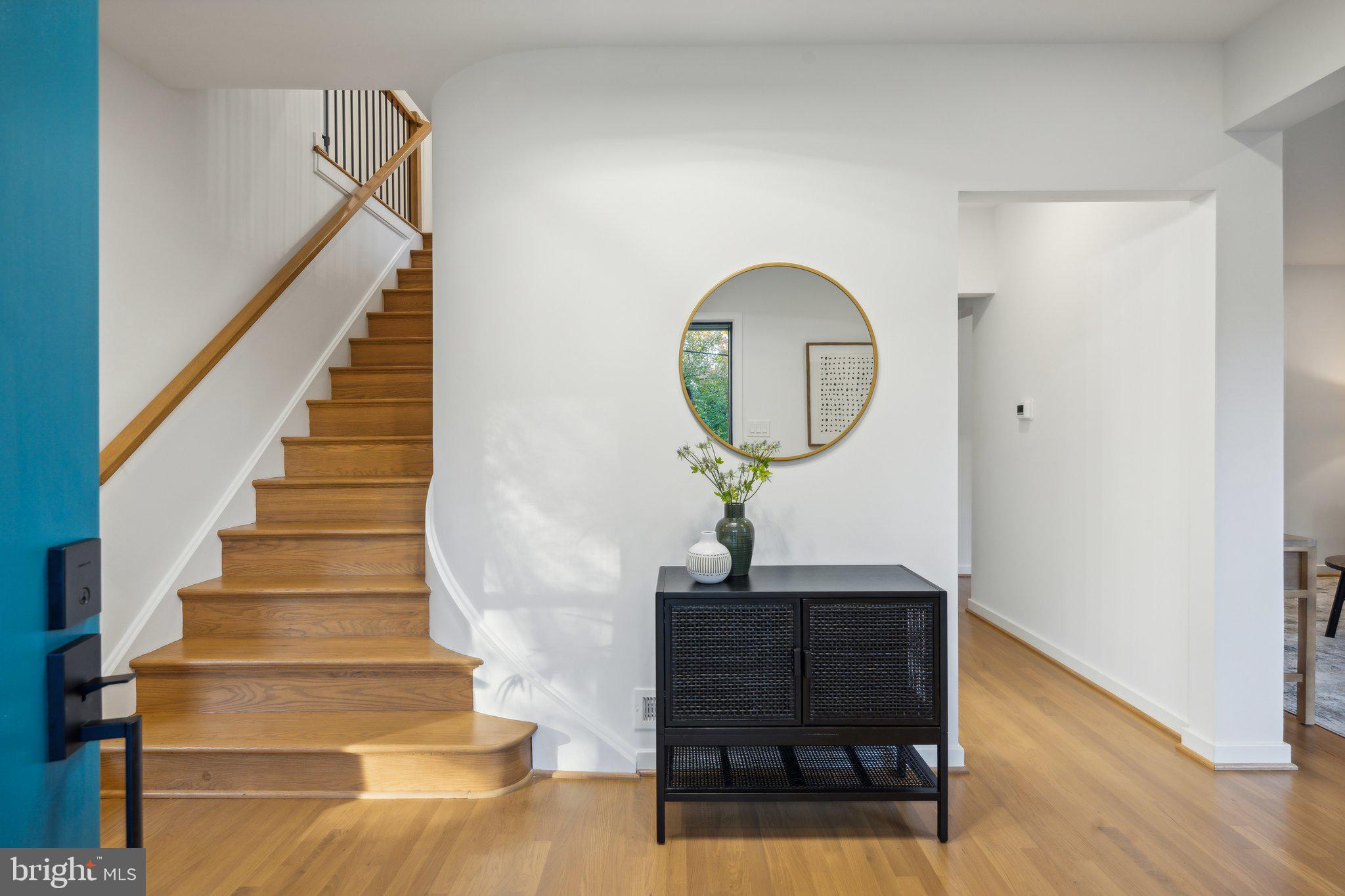 1803 Snowdrop Lane Silver Spring, MD 20906 - Photo 3 of 41 a view of entryway and hall with wooden floor