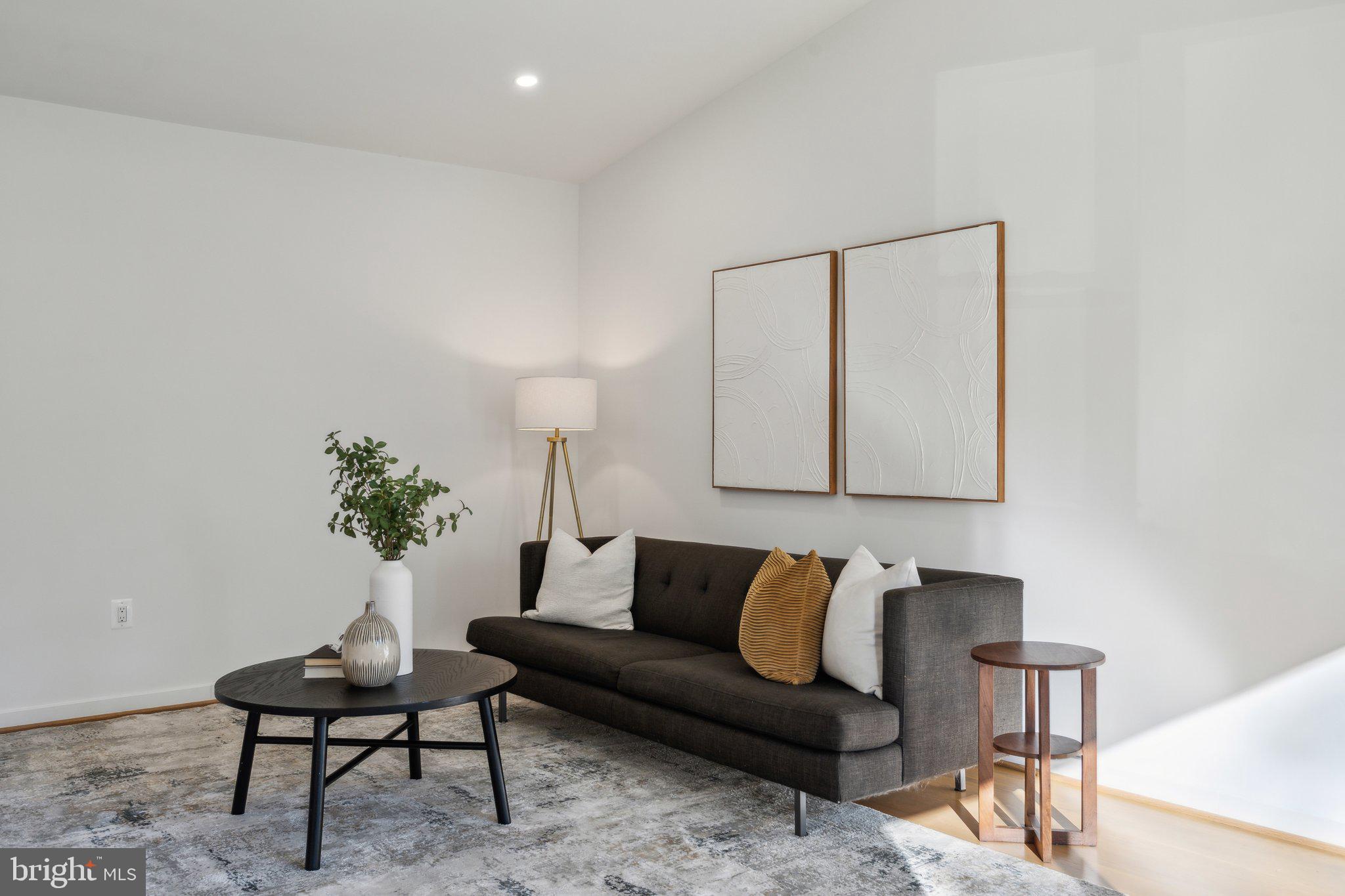 1803 Snowdrop Lane Silver Spring, MD 20906 - Photo 5 of 41 a living room with furniture and a potted plant