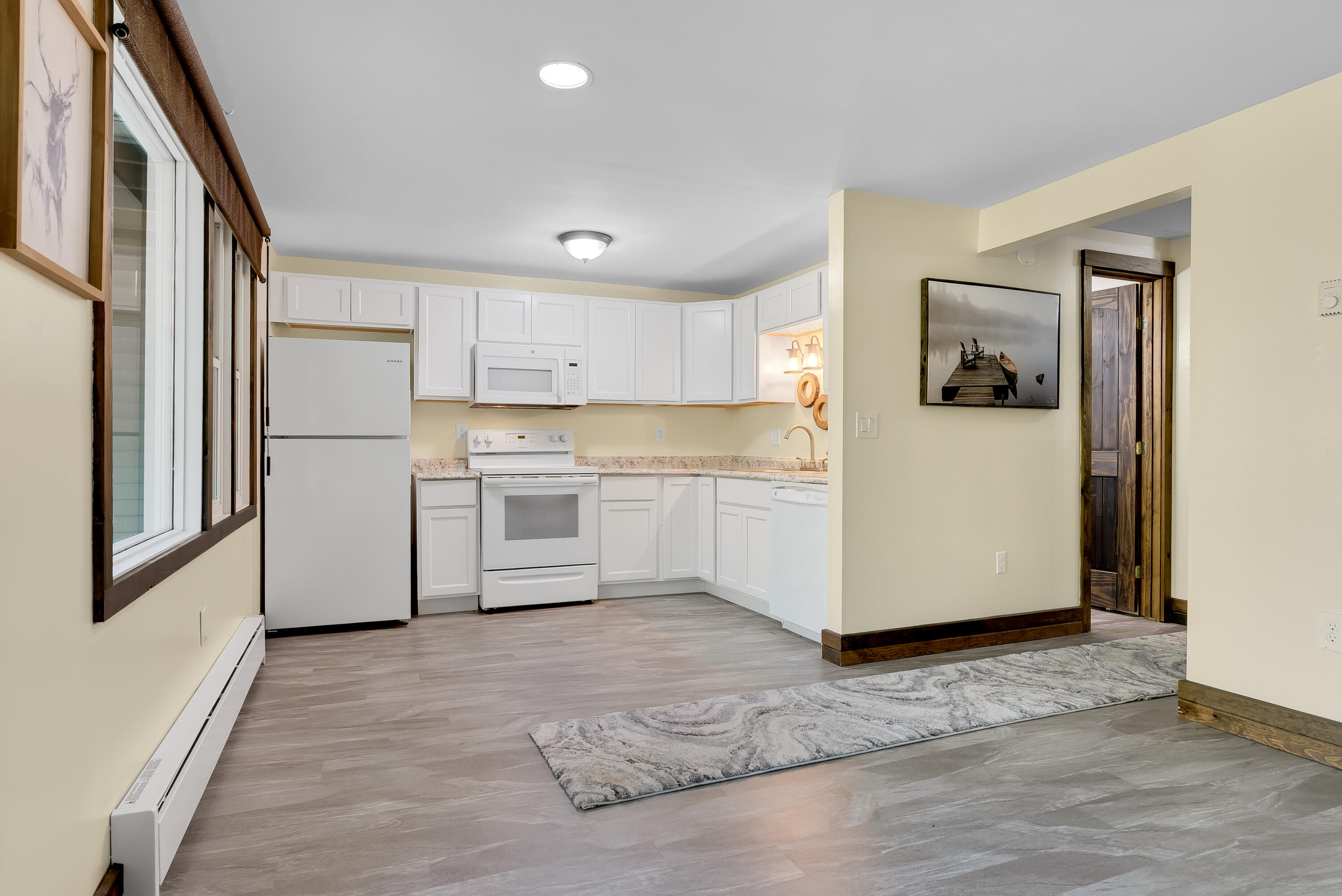 10 East Pinnacle Road, Unit 10 Bridgton, ME 04009 - Photo 28 of 44 Lower Level Kitchen