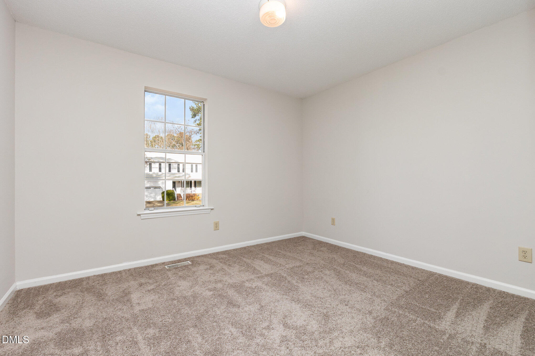 2108 Carthage Circle Raleigh, NC 27604 - Photo 16 of 27 an empty room with windows