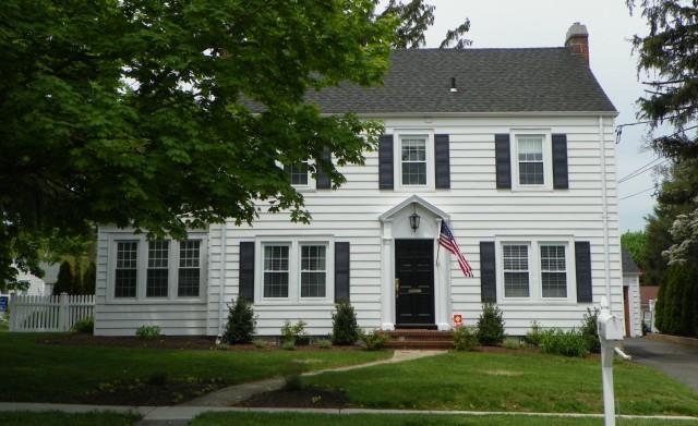 330 Meadowbrook Road Fairfield, CT 06824 - Photo 1 of 1 front view of a house with a yard