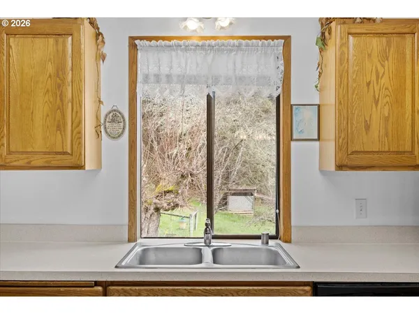 a bed room with a bed and a window