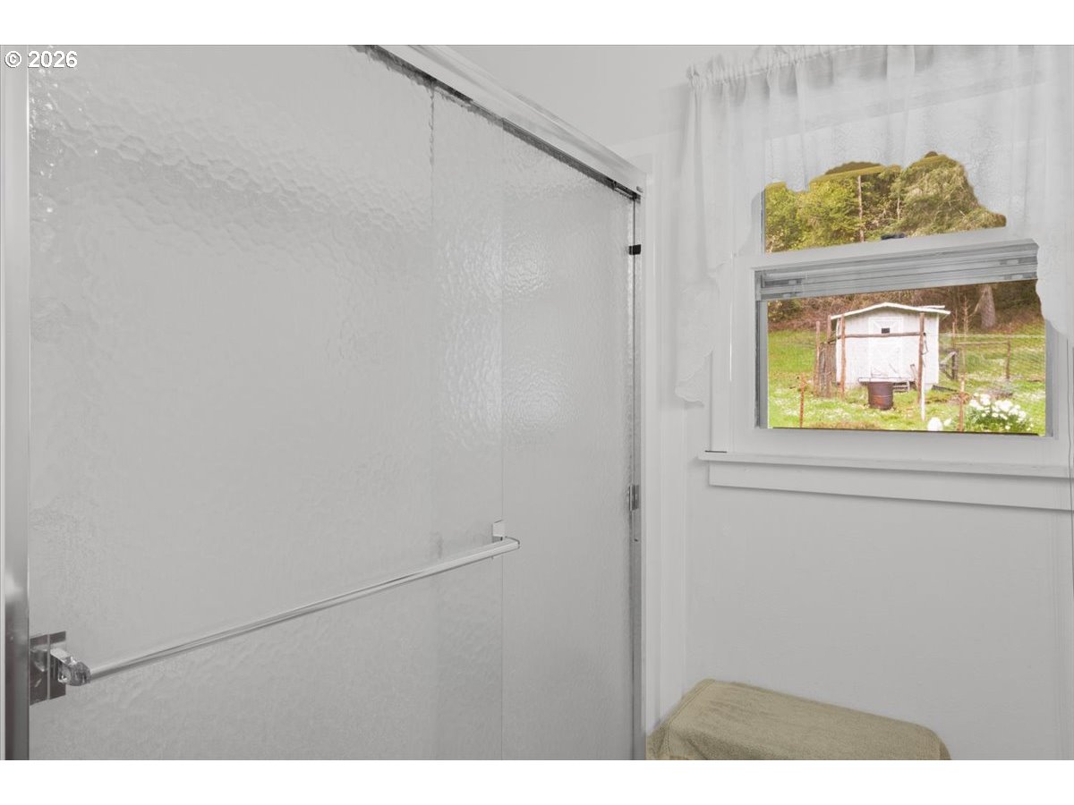 2277 Cougar Creek Road Oakland, OR 97462 - Photo 17 of 34 a view of a hallway with wooden floor
