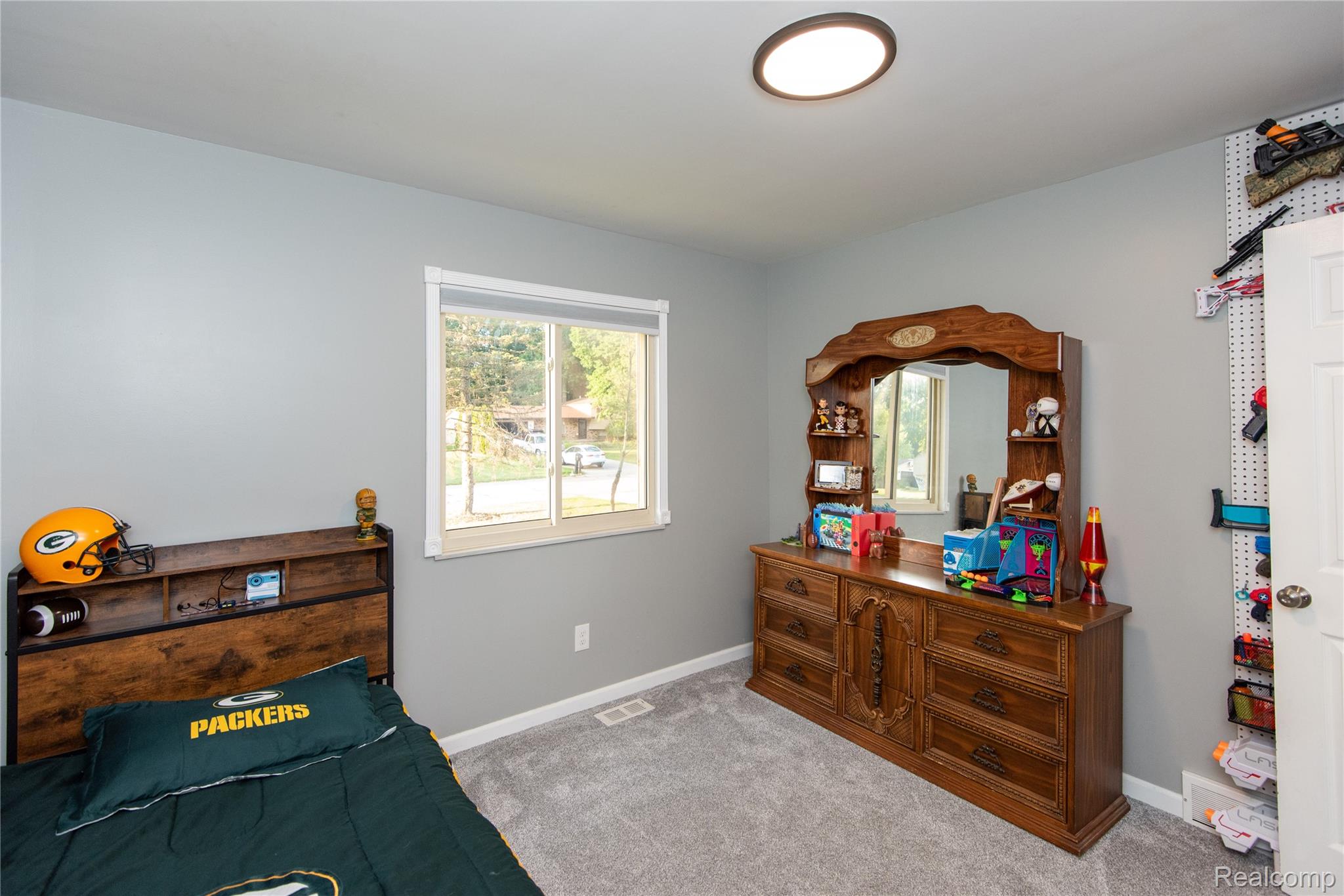 4395 Regency Road Swartz Creek, MI 48473 - Photo 49 of 67 Wall-to-wall carpeting, recessed ceiling light, and a window with white trim